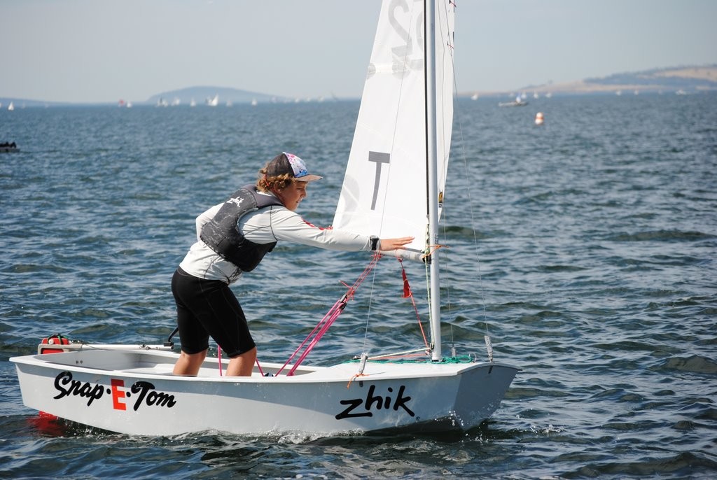 Sabot winner Tom Cooper checks his boat before a race start - Crown Series Bellerive Regatta 2012 © Rob Cruse